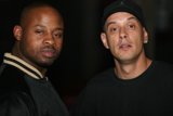 Two Men in Jackets and Caps