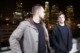 Two Men Overlooking the Metropolis