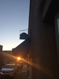 Sunset Reflections on a City Street