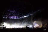 Rocking Out in a Smoky Spotlight