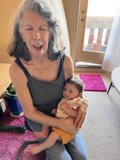 Loving Grandmother with Grandchild on Lap