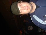 Blue-Shirted Man at the Pub