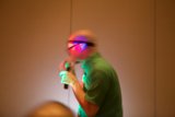 Green Shirted Man Takes the Mic