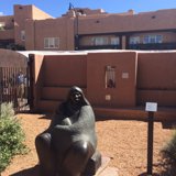 Statue of a Woman Amidst the Blue Skies of Santa Fe
