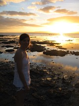 Golden Sunset Silhouette on Fiji's Rocky Shore