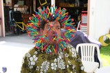 Man Wearing Giant K'Nex Sculpture Around His Face