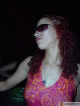 Red-haired Woman in Sunglasses