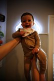Joyful Baby Held High