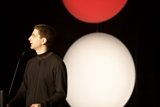 Jeff M delivering a speech at Defcon 17 with a unique podium