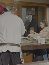 Family Meal at Japanese Restaurant Counter