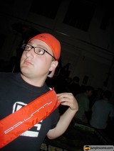 Urban Portrait of a Man in Glasses and Baseball Cap