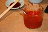 Red Sauce Served with Utensils