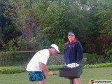 Two Men Enjoying a BBQ in the Hawaiian Sun