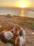 Sunset Serenity with Furry Friend