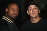 Two Men with Baseball Caps