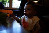 Baby's Playful Mealtime