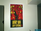 While You Were Sleeping" Poster Adorns Modern Art Gallery Wall
