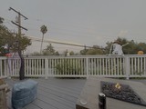 Evening Deck Gathering with Fire Pit
