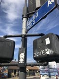 Man on a Street Sign