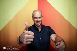 Bald Man Gives Thumbs Up in San Francisco
