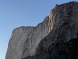 Shimmering Slate: A Mountain Bathed in Sunlight