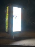 Nighttime Bus Stop Sign