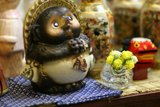 Playful Figurine Among Flowers