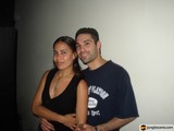 Lovebirds in front of a wall