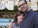 Couple Smiling Together at Disneyland's It's a Small World