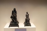 Sitting Bronzed Figures