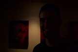 Portrait of a Happy Man in an Art Gallery