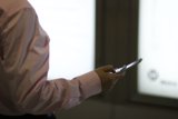 Tech-Savvy Man with a Dress Shirt and Mobile Phone