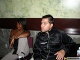 Couple Sitting Together in Fashionable Jackets