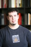 The Man with the Black Shirt in the Library