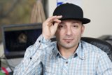 Hat-wearing Man in Plaid