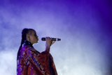 FKA twigs Beautiful Upper Body Profile Singing Eyes Closed Baby Hairs Swirls Hoop Earrings Braided Ponytail Rings Kimono Red Brocade Gold Purple Patterns Purple Blue Lighting Heavy White Haze