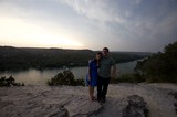 Couple Embracing at Sunset Overlook Above Lake Austin