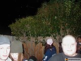 Nighttime Gathering by the Fence