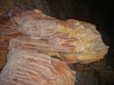 Mysterious Face on a Slate Rock in a Cave