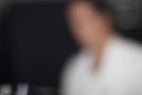 Blurry Portrait of a Man in White Shirt