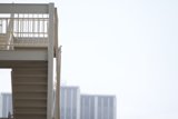 Skateboarder Takes On Staircase Handrail
