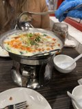 Enjoying a Delicious Bowl of Stew