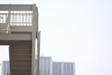 Skateboarder Conquers Staircase Handrail