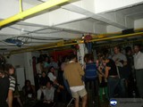 Yellow-Lit Crowd at the Cock Fight
