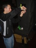 Man Enjoying a Drink and a Game