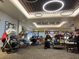 Family Gathering in Modern Airport Lounge