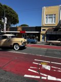 Vintage Sports Car at the Crosswalk