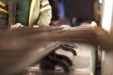 Factory Worker Operating Machinery