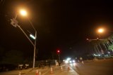 Night Traffic Halted by Street Light