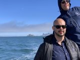 Two Men Enjoying the Ocean